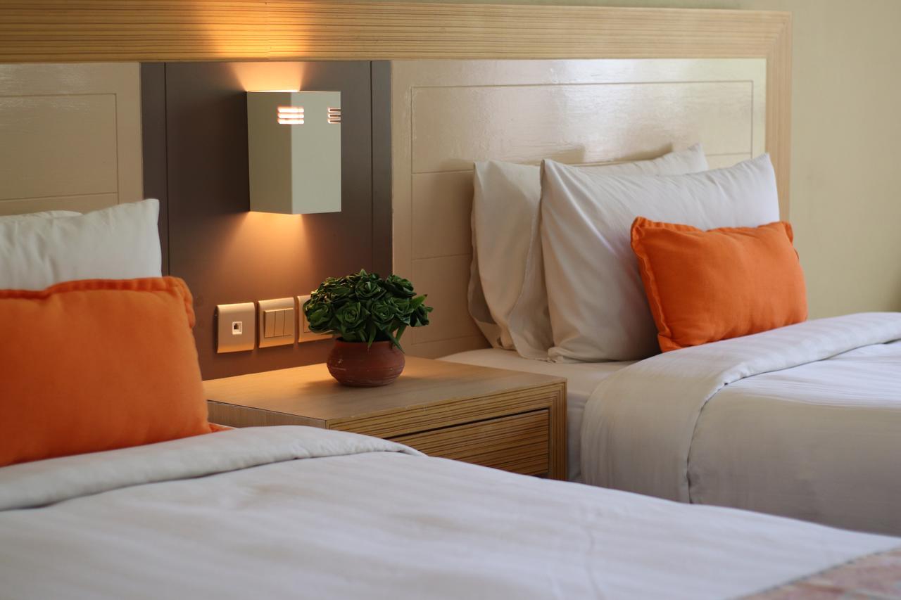 Damai Puri Resort & Spa Кучинг Екстериор снимка A room at the hotel